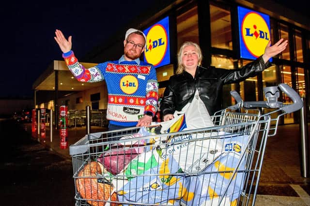 Shoppers across the region were swept up in festive fever as they took on the retailer’s annual Trolley Dash on Saturday 10th December. 41 lucky customers took on their very own supermarket sweep, working against the two-minute timer to bag as many items as they could – for free! Trolley Dash ticket sales this year raised more than £90,000 for the retailer’s well-established charity partner, NSPCC Northern Ireland. Pictured celebrating their winning dash is Lidl Buncrana Road Store Manager Niall Harrigan and winning customer Martina Nash. Martina Nash walked away with a festive feast worth £315.18.