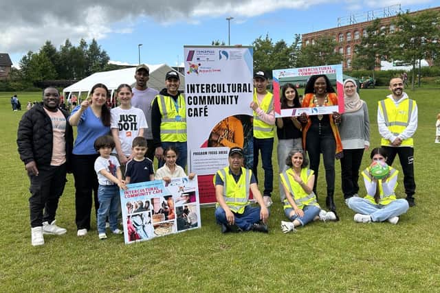 Mayor of Derry City and Strabane District Council, Lilian Seenoi Barr, with staff, volunteers and members of the North West Migrants Forum in Brooke Park on Saturday where a new Intercultural Café, funded through PEACEPLUS, was launched. Work on the project is expected to begin before September.