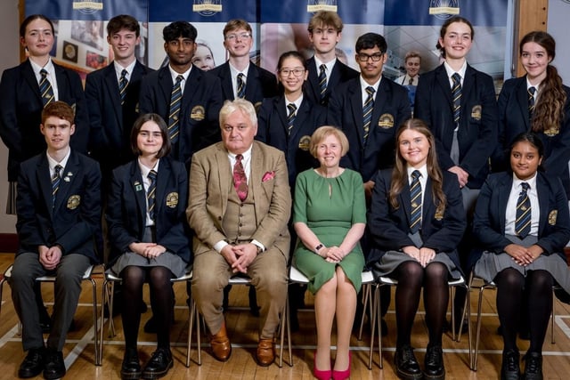 Pupils who achieved 10 or more A* grades in GCSE Examinations pictured with Mr Micheal Harron (Board of Governors) & Dr Marie Ferris (Vice Principal).