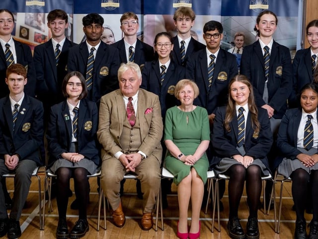 Pupils who achieved 10 or more A* grades in GCSE Examinations pictured with Mr Micheal Harron (Board of Governors) & Dr Marie Ferris (Vice Principal).