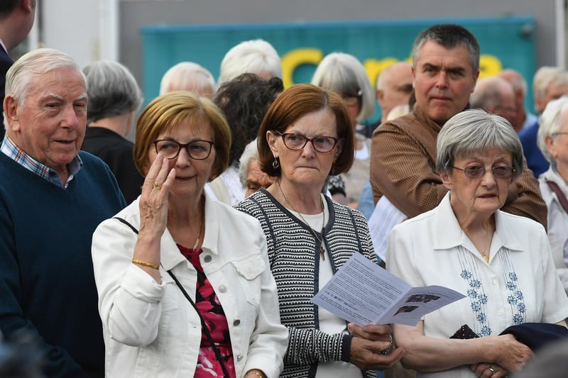 People gather for a service in Claudy marking the 52nd anniversary of the car bombings that killed nine people and injured 30 others. Photo: George Sweeney