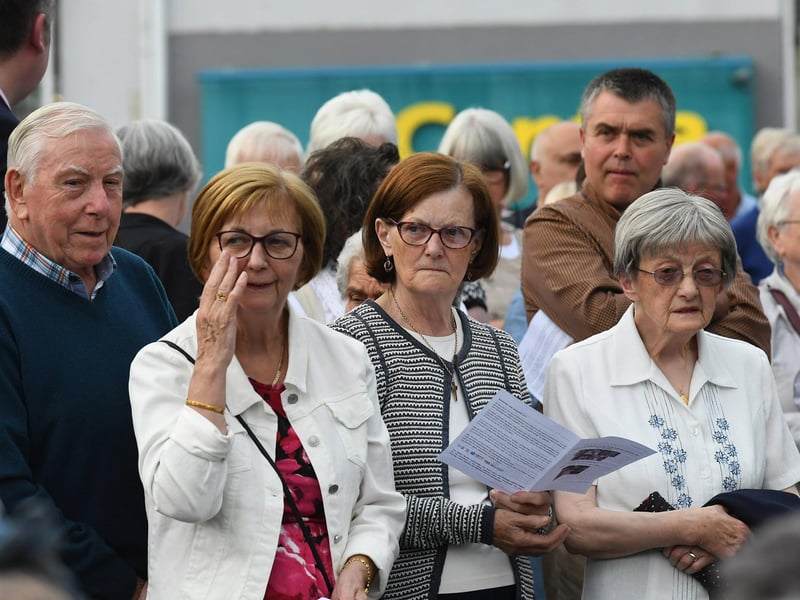 People gather for a service in Claudy marking the 52nd anniversary of the car bombings that killed nine people and injured 30 others. Photo: George Sweeney