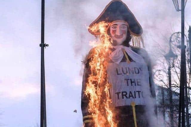 An effigy of Robert Lundy being burnt at a previous demonstration in Derry.