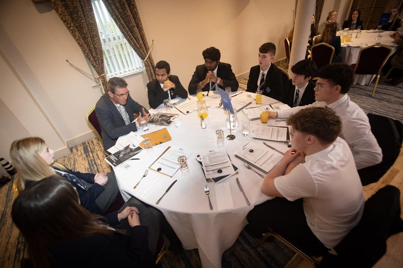 Councillor John Boyle debating with students at Friday's 'Let's Talk' event.