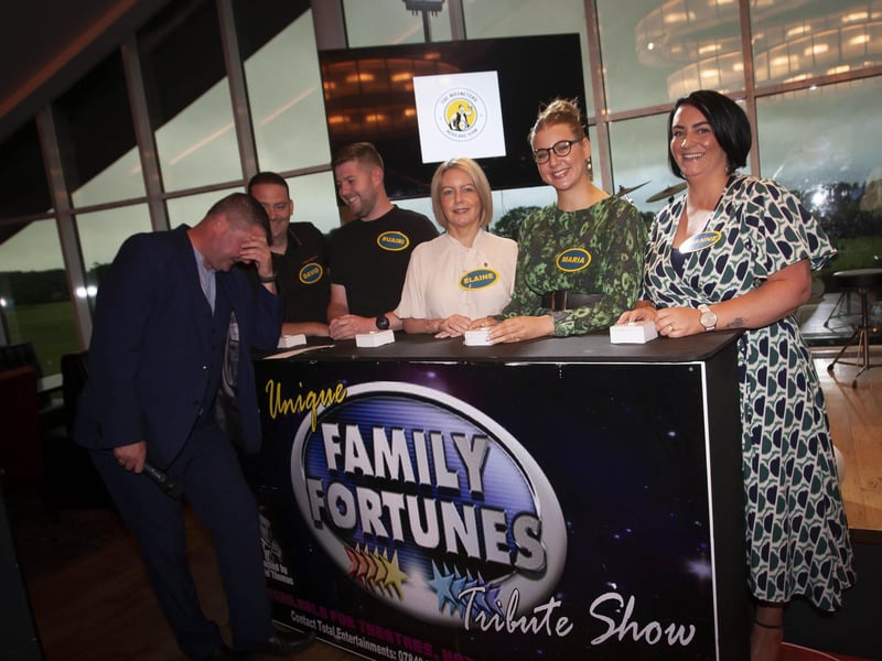 OH DEAR!. . . .Quizmaster Conga McBride accepts an ‘answer’ from the No Booze Babes on Friday night. From left, David Nash, Ruairi Friel, Elaine Breslin, Maria Nash and Joanne Nash.