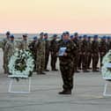 Peacekeepers of the United Nations Interim Force in Lebanon (UNIFIL) attend the repatriation ceremony for Irish soldier Sean Rooney who was killed on a UN patrol, at Beirut international airport on December 18, 2022. - The United Nations peacekeeping force in south Lebanon urged Beirut to ensure a "speedy" investigation into the fatal shooting of an Irish soldier this week. The convoy of the United Nations Interim Force in Lebanon (UNIFIL) came under fire near the village of Al-Aqbiya late on December 14, also wounding three other peacekeepers, the Irish military said. (Photo by ANWAR AMRO / AFP) (Photo by ANWAR AMRO/AFP via Getty Images)