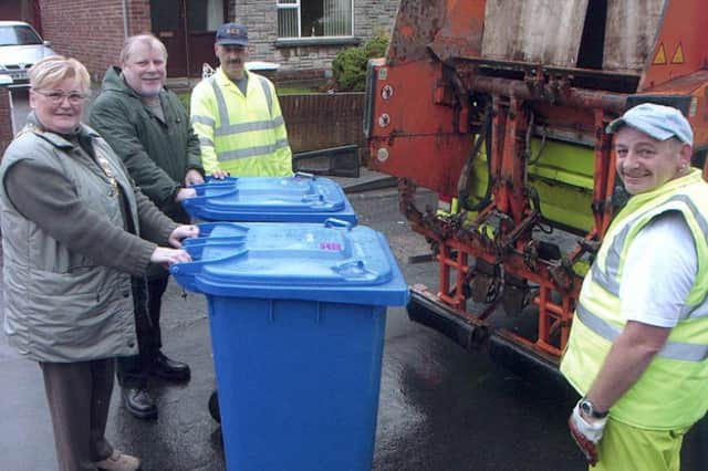 Refuse collectors Russ Colville and Eddie McCarron with Mayor, SDLP Colr. Kathleen McCloskey and Sinn Féin Colr. Gerry MacLochlainn, chair of the Environmental Services Committee on the first ever blue bin collection run in Derry back in February 2003.