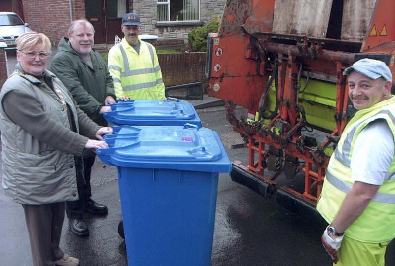 Refuse collectors Russ Colville and Eddie McCarron with Mayor, SDLP Colr. Kathleen McCloskey and Sinn Féin Colr. Gerry MacLochlainn, chair of the Environmental Services Committee on the first ever blue bin collection run in Derry back in February 2003.
