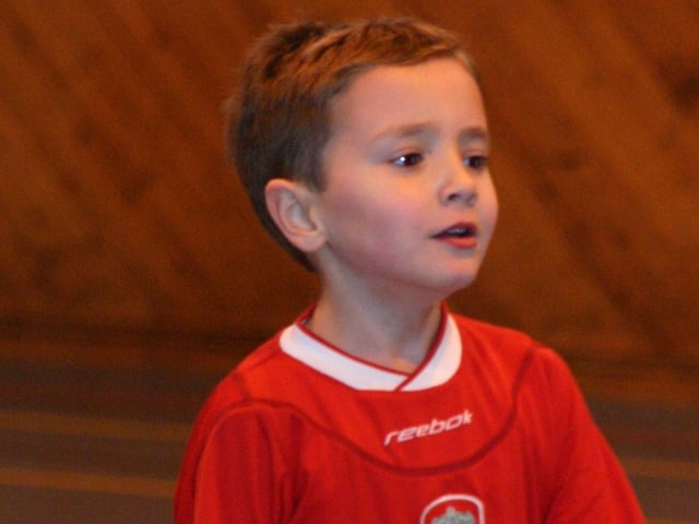 Birthday Boy Aidan Dunn keeps a close eye on the ball during his Football party. 2146/dd : Parties and celebrations January 2006: Aidan Dunne.