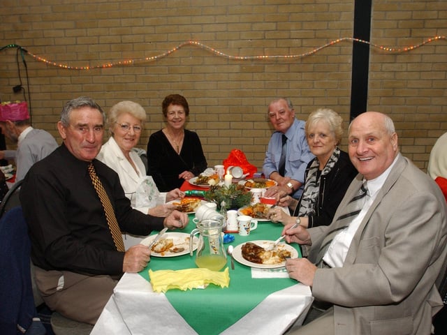 From left, Patrick McMenamin, Patricia McGlinchey, Lyla Millar, Don O'Reilly, Agnes Keogh, and Patsy Millar. (0912PG21) :Christmas parties for Derry's senior citizens in December 2003