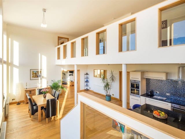 Open plan kitchen and dining area.