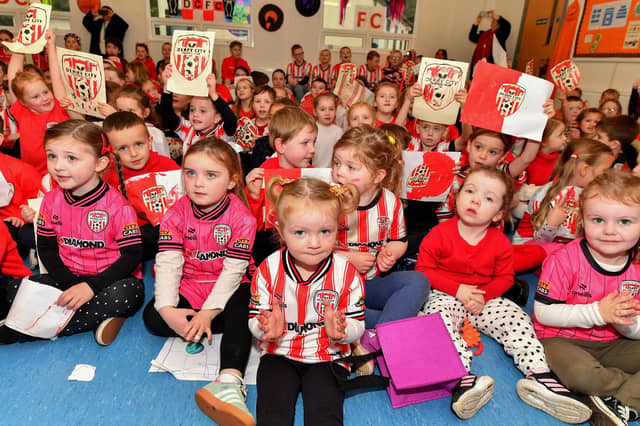 Pupils from Gaelscoil Eadain Mhoir pictured during the visit from Derry City players Ciaran Coll and Pat Hoban. Photo: George Sweeney