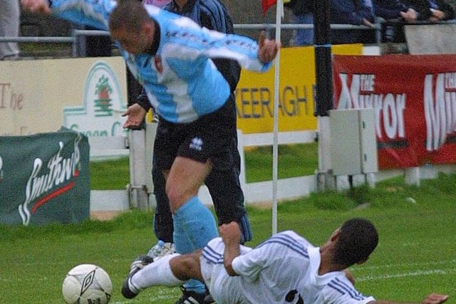 Tommy McCallion attempts to vault a tackle.