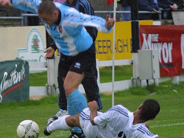 Tommy McCallion attempts to vault a tackle.