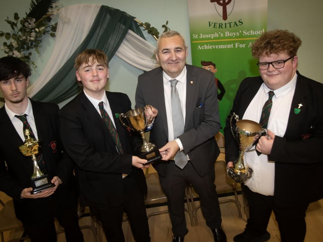 Mr Gerry Beattie, Senior Teacher, pictured with award winners Charlie Atkins, Declan Barr and Tristan Doran at the St. Joseph's Annual Prizegiving. (Photos: Jim McCafferty Photography) : .