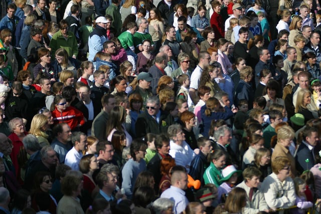 Some of the large crowd who thronged to the Guildhall Square in a glorious St. patrick's Day . 91803Jb15):.