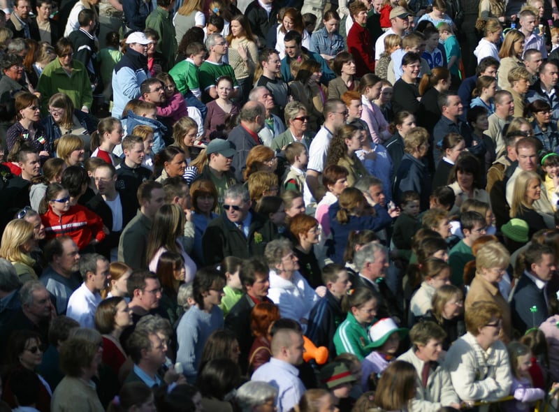 Some of the large crowd who thronged to the Guildhall Square in a glorious St. patrick's Day .  91803Jb15):.