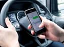 Using mobile phones is illegal while driving.