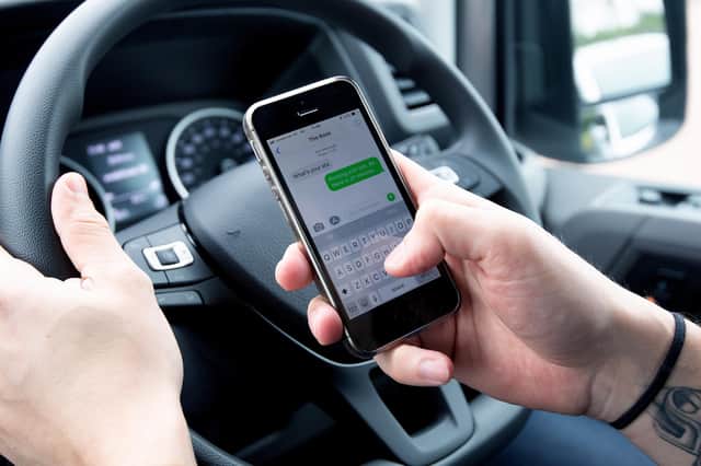 Using mobile phones is illegal while driving.