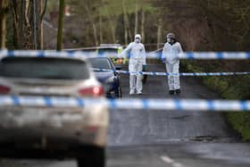 OMAGH, NORTHERN IRELAND - FEBRUARY 23: Police and forensics are seen at the scene of last nights shooting of a high profile PSNI officer at the Youth Sports Centre on February 22, 2023 in Omagh, Northern Ireland. (Photo by Charles McQuillan/Getty Images)