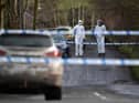 OMAGH, NORTHERN IRELAND - FEBRUARY 23: Police and forensics are seen at the scene of last nights shooting of a high profile PSNI officer at the Youth Sports Centre on February 22, 2023 in Omagh, Northern Ireland. (Photo by Charles McQuillan/Getty Images)