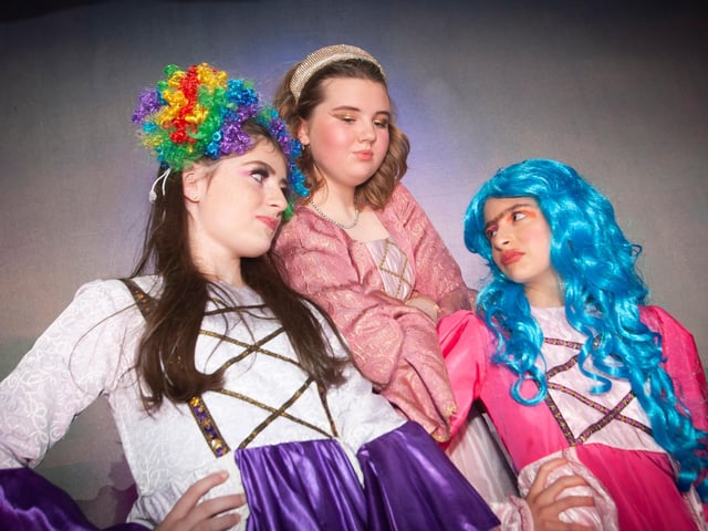 Farrah McFeely, Mia Harmon and Ella Connelly perform as the Ugly Sisters and the Stepmother in Cinders with a Difference