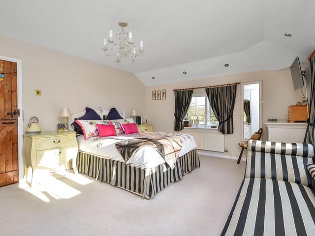 This three bed house in Trampers Lane, Boarhunt, near Fareham, is on the market for £825,000. It is listed by Fine and Country.