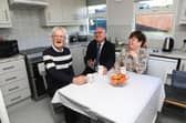The heart of the home…Delighted tenants Alan and Charlotte Donnell welcome Eddie Doherty, Housing Executive West Area Manager (middle) into their beautiful home.