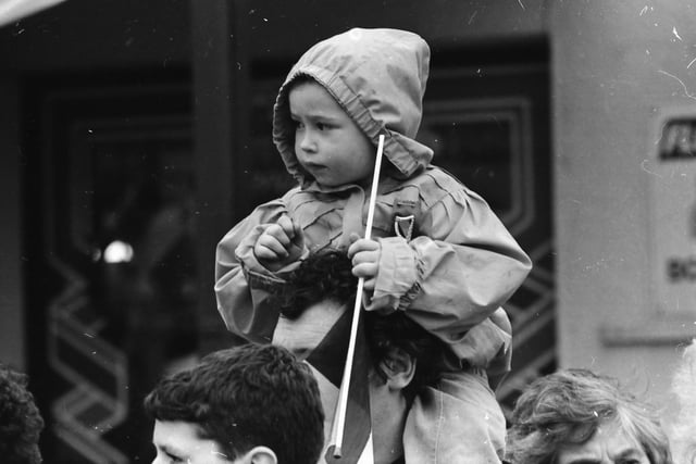 A young observer of the St. Patrick's Day parade in Moville on March 17, 1993.