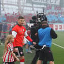 Patrick McEleney, leading Derry City out for the FAI Cup Final at the Aviva last month, could be back at Brandywell next season.