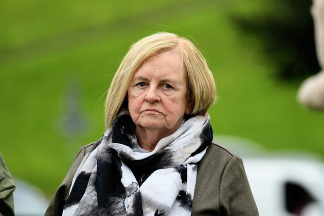 Bernadette McAliskey at Free Derry Wall during Palestinian photojournalist Motaz Azaiza’s visit to Derry on Thursday. Photo: George Sweeney