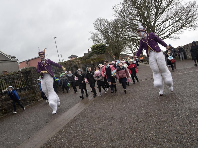 Children from local schools pictured taking part in Feile Derry's Easter Bonnet Parade through the city's Walls and down to Guildhall Square on Wednesday morning. (Photos: Jim McCafferty Photography)