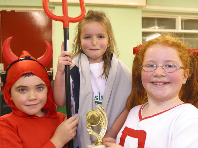 All dress up for the Halloween party in Ballymacgoraty Community Centre left to right Jordon McLaughlin Carla McLaughlin and Sofie McMonagle 9880dd : Derry Parties & Celebrations November 2005: Ballymagroarty Community party.