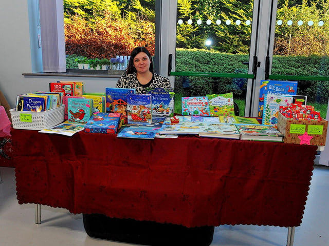 Kelly-Ann Temple and her stall at the Christmas Craft Fair held in the Galliagh Community Centre on Saturday afternoon. Photo: George Sweeney. DER2250GS – 77