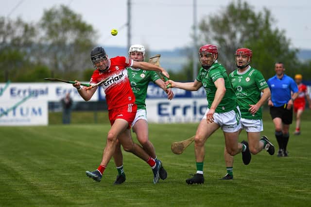 London trio Cathal O'Carroll, Robbie Murphy and Tom Millerick pursue James Friel at Owenbeg on Saturday. Photo: George Sweeney