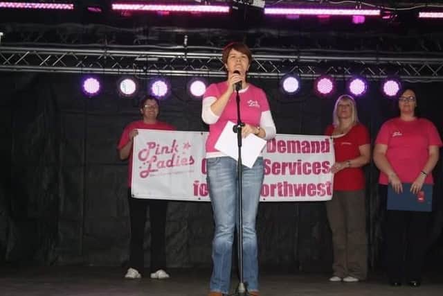 Maureen Collins in 2011 pictured addressing the crowd at the Day of Action. This event took place after the announcement that Derry would not be getting a North West Cancer Centre.