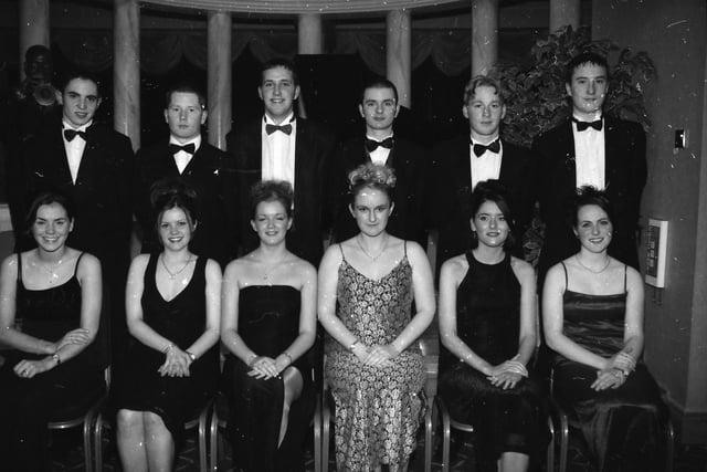 Seated, from left, Joanne Sharkey, Bronagh Ward, Ciara Campbell, Tracey Moffitt, Geraldine McCaul and Joanne Kelly. Standing, from left, Ronan Bonnar, Gerard McGonagle, Michael Doherty, Simon Bradley, Gary Cassidy and David Doherty. Pictured at the 1998 Thornhill College Formal.