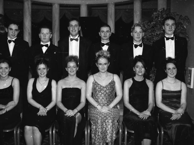Seated, from left, Joanne Sharkey, Bronagh Ward, Ciara Campbell, Tracey Moffitt, Geraldine McCaul and Joanne Kelly. Standing, from left, Ronan Bonnar, Gerard McGonagle, Michael Doherty, Simon Bradley, Gary Cassidy and David Doherty. Pictured at the 1998 Thornhill College Formal.