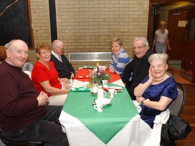 From left, John Dunne, Mary Magowan, John Magowan, Moya Barron, Patrick Meenan, and Mary Callan. (0912PG18) :Christmas parties for Derry's senior citizens in December 2003