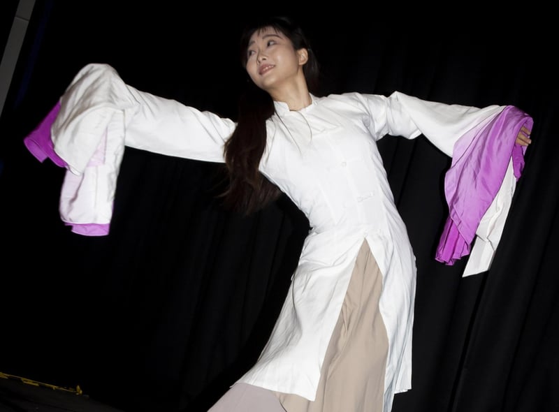 One of the traditional Chinese dancers performing at Steelstown PS last week.