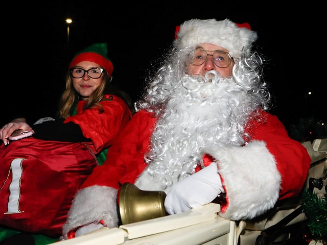 Santa and his elves at Enagh Crescent to switch on the Christmas tree lights.  (Photo - Tom Heaney, nwpresspics)