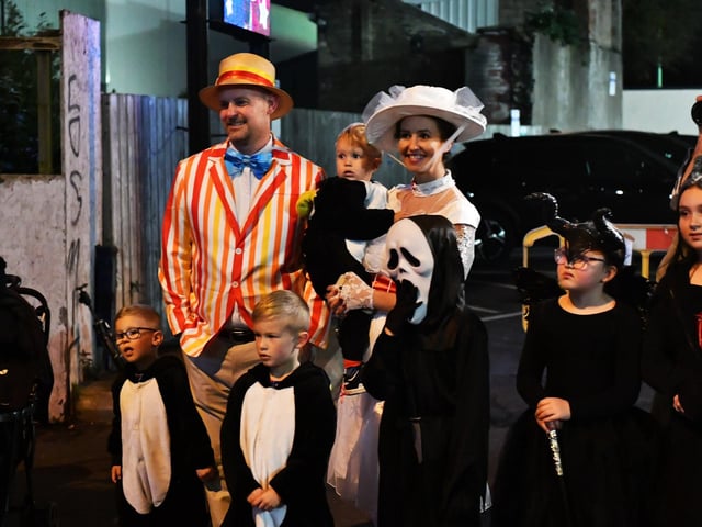 Spectators pictured at the Halloween parade. Photo: George Sweeney