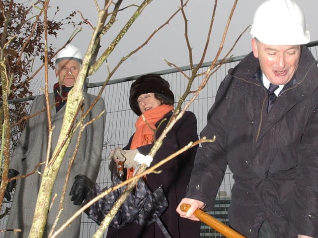 Dr Don Keegan, Consultant Altnagelvin Hospital, planting a tree at the site of the new Rehabilitation Unit at site. Included are Me Denis Desmond, chairman and Mrs Stella Burnside, chief executive, Altnagelvin.