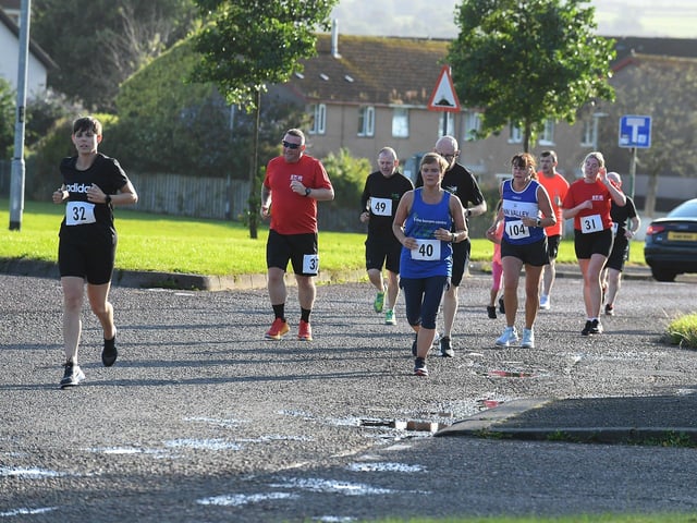 Competitors take part in the inaugural Galliagh Féile 5K road race on Friday evening. Photo: George Sweeney