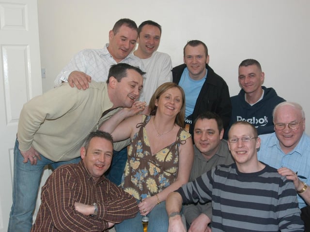 Friends and family celebrating Donna's birthday at home.