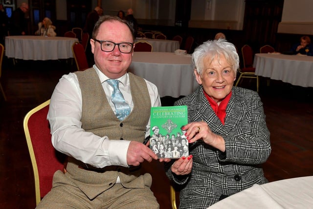 Eamon Sweeney author of ‘Feis Dhoire Cholmcille: Celebrating a Century of Culture’ pictured with his mother-in-law Patricia McClintock at the book launch held in St Columb’s Hall on Tuesday evening. Photo: George Sweeney. DER2308GS – 72