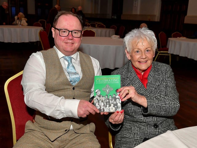 Eamon Sweeney author of ‘Feis Dhoire Cholmcille: Celebrating a Century of Culture’ pictured with his mother-in-law Patricia McClintock at the book launch held in St Columb’s Hall on Tuesday evening. Photo: George Sweeney. DER2308GS – 72