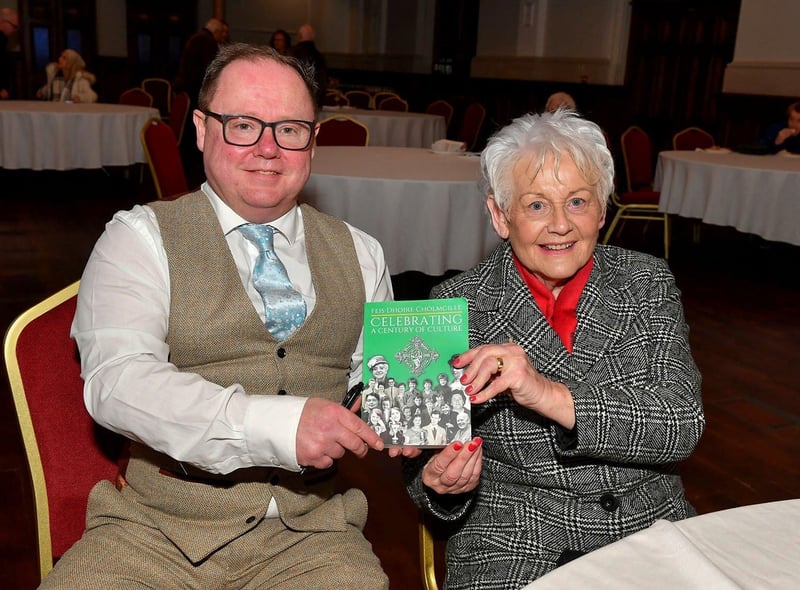 Eamon Sweeney author of ‘Feis Dhoire Cholmcille: Celebrating a Century of Culture’ pictured with his mother-in-law Patricia McClintock at the book launch held in St Columb’s Hall on Tuesday evening. Photo: George Sweeney. DER2308GS – 72