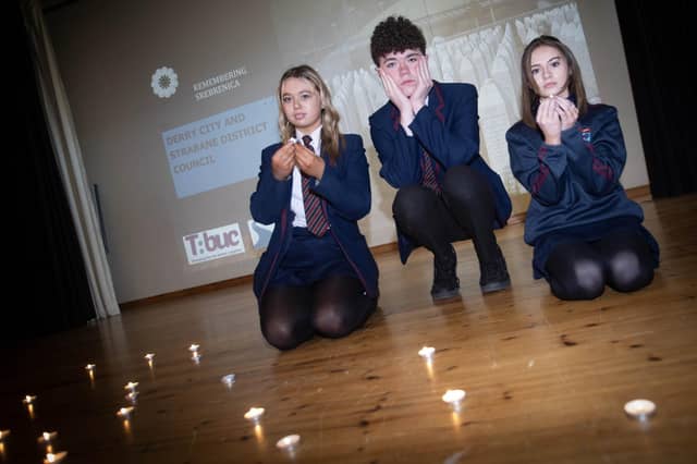 Oakgrove students Khloe Bradley, Corey Harkin and Leah McKnight pictured remembering Holocaust Day at last week's event.