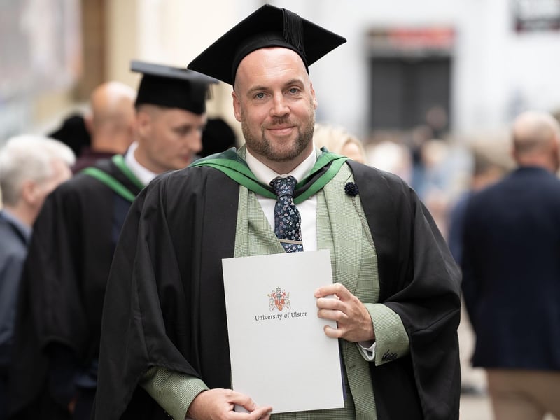 Seamus Barr from Derry graduates with a degree in Computer Science from Ulster University in Derry on Monday July 8.  (Photo: Nigel McDowell / Ulster University)